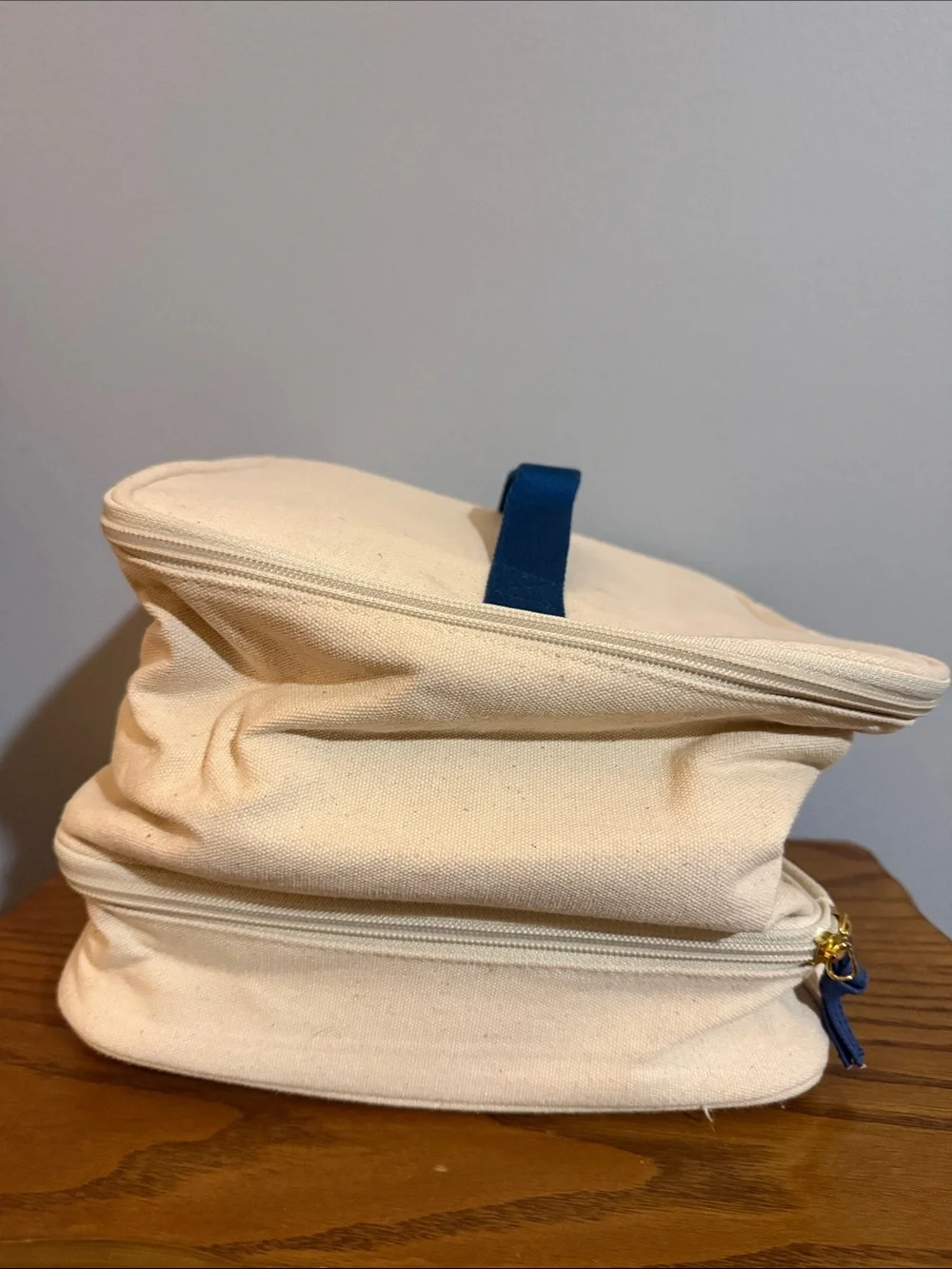 Chloe + Isabel Cream Canvas Cosmetic Pouch with Yellow & Navy Bird Logo